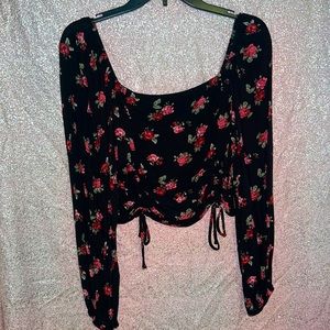 Long sleeve black cropped top with red rose print